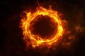 Fiery ring of flames glowing against a dark background Royalty Free Stock Photo