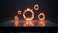 Fiery rings and hand shape levitating above a rustic wooden table Royalty Free Stock Photo