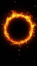 Fiery solar eclipse ring with vibrant flames against a cosmic black background Royalty Free Stock Photo