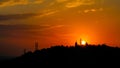 Fiery sunrise over the lake in a mountain village in the Rhodope Mountains