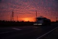 Fiery sunset along the highway