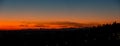 Fiery sunset from Bergamo city to the Po valley. Lombardy, Italy. Sunset during fall season Royalty Free Stock Photo