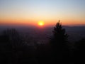 Fiery sunset from Bergamo city to the Po valley. Lombardy, Italy. Sunset during fall season. Royalty Free Stock Photo