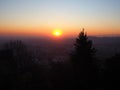 Fiery sunset from Bergamo city to the Po valley. Lombardy, Italy. Sunset during fall season. Royalty Free Stock Photo