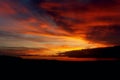 Fiery sunset. Bright red clouds. Twilight on earth Royalty Free Stock Photo