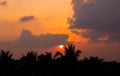 Fiery sunset with darkness forceground in asia. Siem reap city, Cambodia