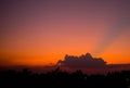 Fiery sunset with darkness forceground in asia. Siem reap city, Cambodia Royalty Free Stock Photo