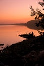 Fiery sunset over the Coquille River in Bandon Oregon. Vertical image Royalty Free Stock Photo