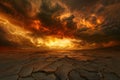 Fiery Sunset Over a Cracked Earth Royalty Free Stock Photo