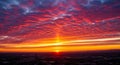 Fiery Sunset Sky with Dramatic Red and Orange Clouds Over a Cityscape sunrise red clouds Royalty Free Stock Photo