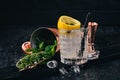 Fiesta Alcoholic Cocktail. Sambuca liqueur, tonic, lemon. Royalty Free Stock Photo