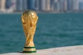 FIFA World Cup Trophy on the Doha corniche, Qatar. Royalty Free Stock Photo