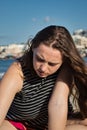 Fifteen year old teenage girl in the sand in Malta