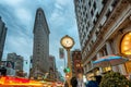 Fifth Avenue Clock with the Flatiron Building, New York City, USA Royalty Free Stock Photo