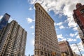 Fifth Avenue Clock with the Flatiron Building, New York City, USA Royalty Free Stock Photo