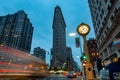 Fifth Avenue Clock with the Flatiron Building, New York City, USA Royalty Free Stock Photo