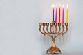 Fifth day of Hanukkah with burning Hanukkah colorful candles in Menorah .Chanukkah-jewish holiday. Royalty Free Stock Photo