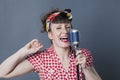 Fifties singer in studio for 30s female performing artist Royalty Free Stock Photo