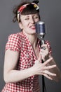 Fifties singer in studio for young woman with retro style