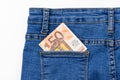 Fifty euro banknote money in pocket jeans pants background texture. 50 euro close up Royalty Free Stock Photo