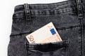 Fifty euro banknote money in pocket jeans pants background texture. 50 euro close up Royalty Free Stock Photo