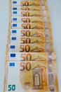 Fifty euro banknotes on a white background close-up