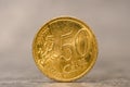 Fifty Euro cent coin on the grey stone background Royalty Free Stock Photo