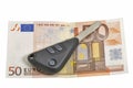 Fifty euros banknote and car keys isolated on white Royalty Free Stock Photo