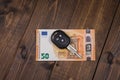 Fifty euros banknote and car keys Royalty Free Stock Photo