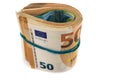 Fifty euros rolled up. Isolated over white background. Royalty Free Stock Photo
