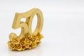 Fifty in golden color for golden wedding or anniversary, birthday on white background for greetin card or invitation Royalty Free Stock Photo