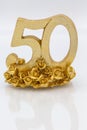 Fifty in golden color for golden wedding or anniversary, birthday on white background for greetin card or invitation Royalty Free Stock Photo