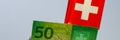Fifty Swiss francs bill on flag background Royalty Free Stock Photo