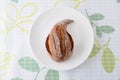 Fig bread french roll on plate on table cloth Royalty Free Stock Photo