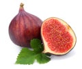 Fig fruit with green leaf isolated on white. Clipping Path Royalty Free Stock Photo