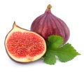 Fig fruit with green leaf isolated on white. Clipping Path Royalty Free Stock Photo