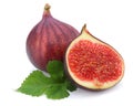 Fig fruit with green leaf isolated on white. Clipping Path Royalty Free Stock Photo