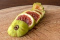 The fig fruit on wooden presentation Royalty Free Stock Photo