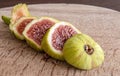The fig fruit on wooden presentation Royalty Free Stock Photo