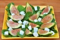 Fig salad with arugula and feta cheese Royalty Free Stock Photo