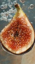 Fig slice in water with reflections and bubbles, macro bright lighting Royalty Free Stock Photo