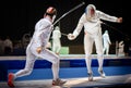 Fight at a fencing competition