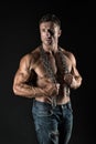 Fight for fitness. Fit man with metal chain black background. Athletic guy with muscular torso. Sexy sportsman or Royalty Free Stock Photo