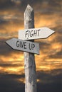 Fight or give up signpost - signpost with two arrows Royalty Free Stock Photo
