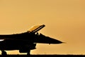 Fighter aircraft sunset