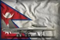 Fighter, interceptor on the Nepal state flag background. 3d Illustration