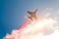 Fighter jet planes fly and leave behind a smoke trail, clouds sun glare.