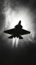 Fighter jet soaring through clouds, dramatic silhouette against bright sky, showcasing power and speed Royalty Free Stock Photo