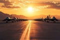 Fighter jets aligned on runway at sunset Royalty Free Stock Photo
