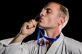 Fighter kissing his gold medal Royalty Free Stock Photo